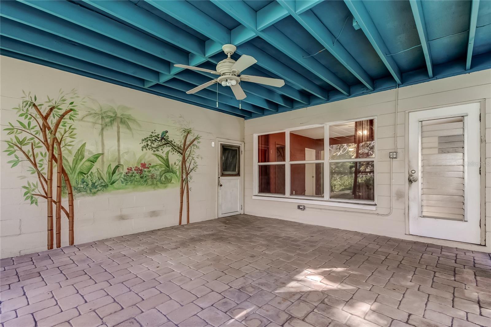 Handpainted Mural is a Delight!  Door on Left enters the Bonus Room - Door on Right enters the Family Room