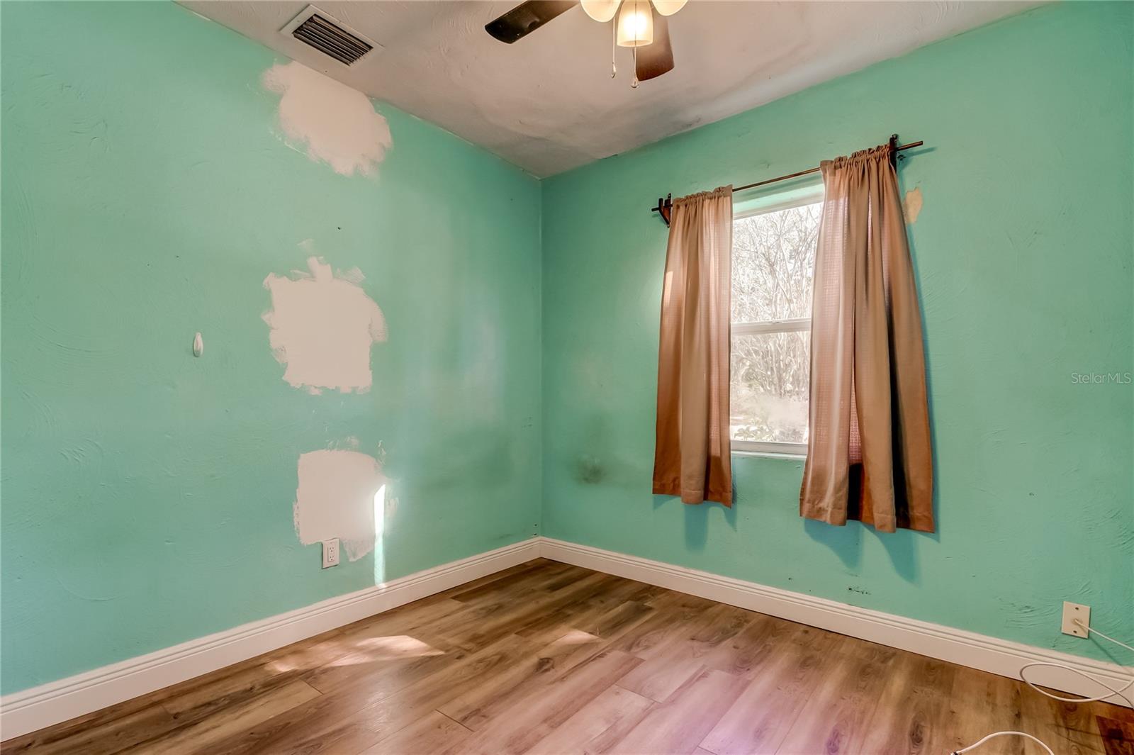 First Bedroom on your Left - The house has been re--wired and cut outs patched