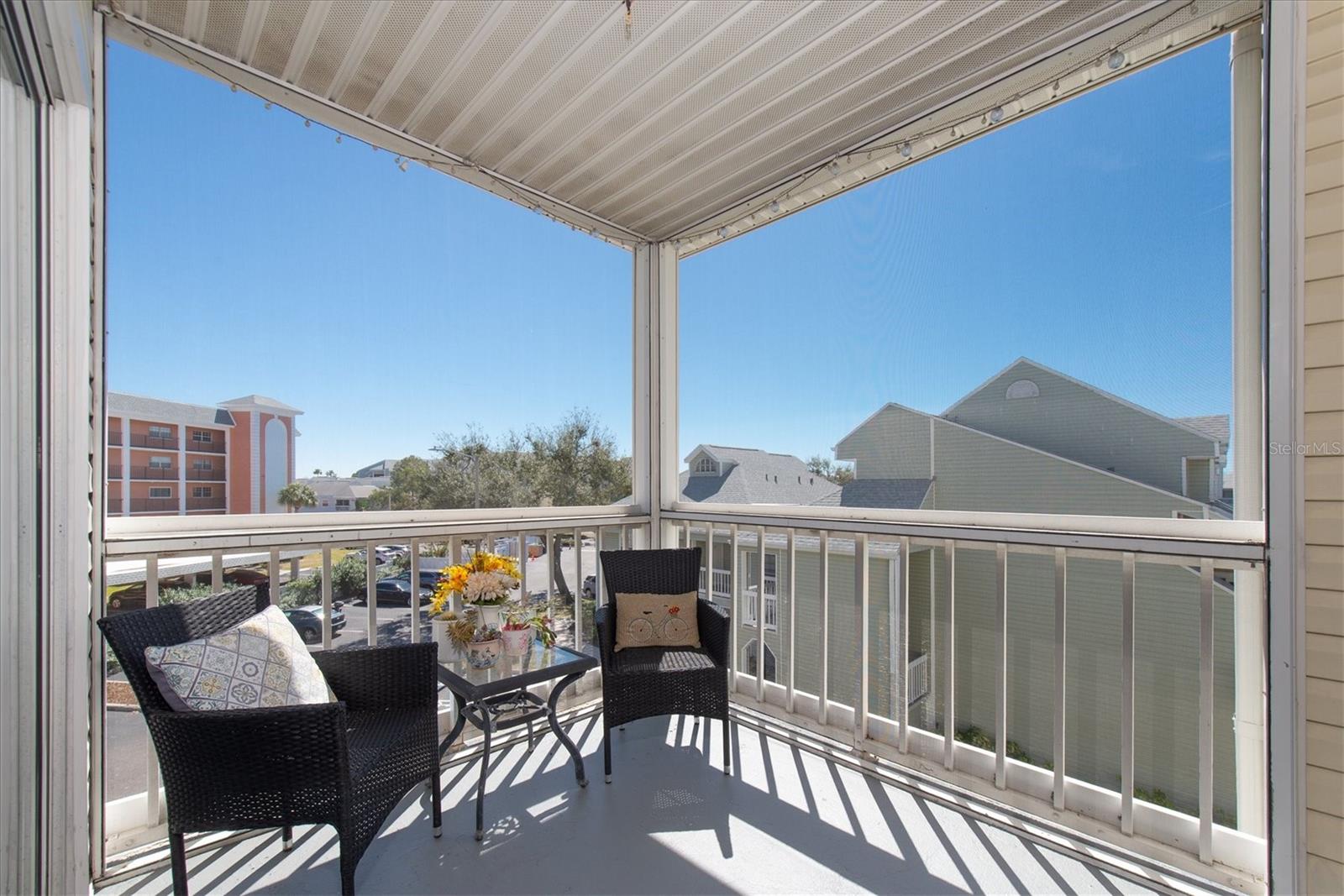 Screened in balcony with great views.