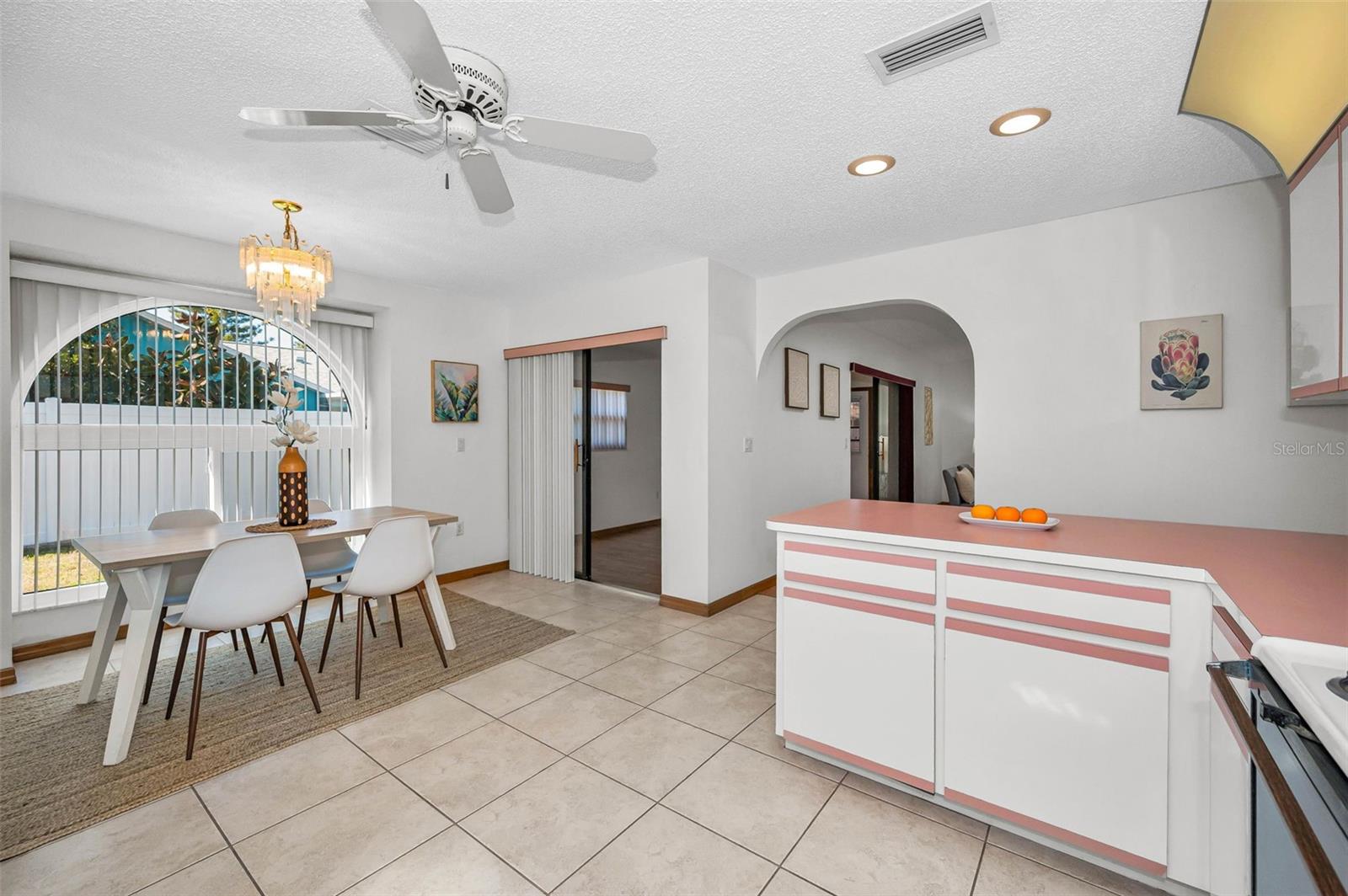 Kitchen and Dining Room. Sliding Doors also open to the Florida Room.