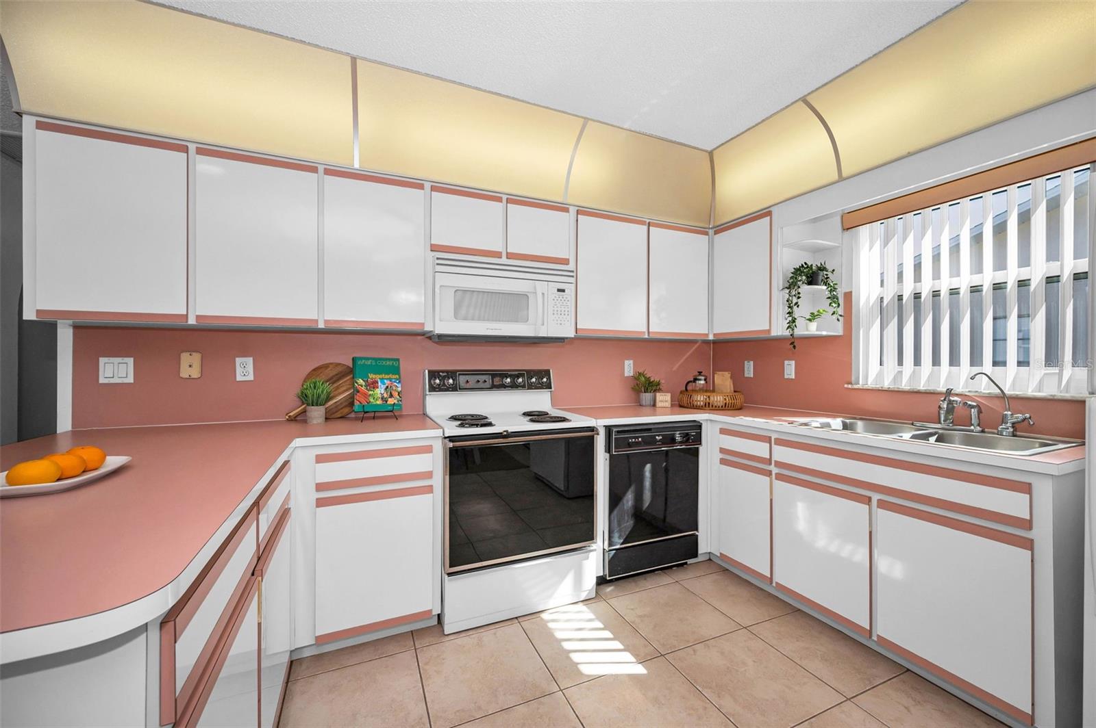 Large Fun Kitchen, Nice and Bright!! This space is perfect for cooking, entertaining, and creating lasting memories. The natural light enhances the warm and inviting atmosphere, making it a true heart of the home.