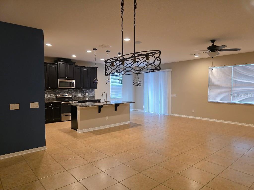 Looking from dining area towards kitchen and dinette area