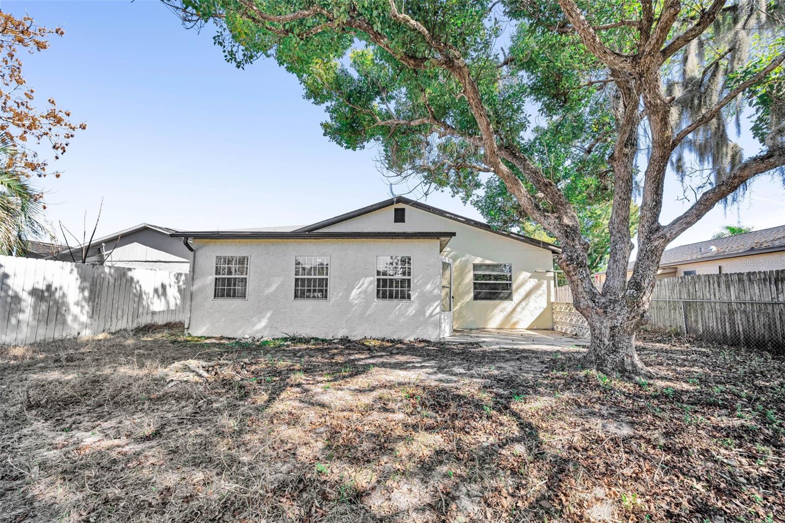 Backyard mostly fenced