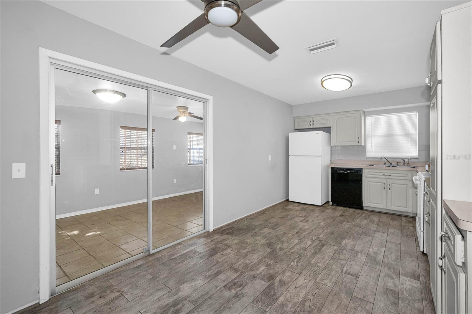 Kitchen has sliders to Florida Room.