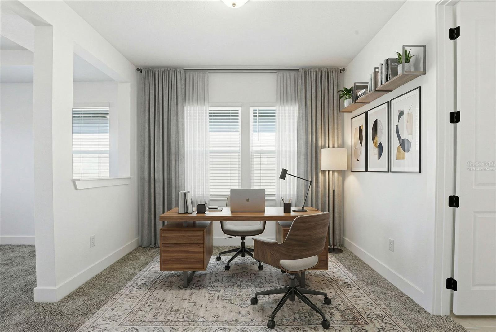 VIRTUALLY STAGED - PRIMARY SUITE W/ SITTING AREA