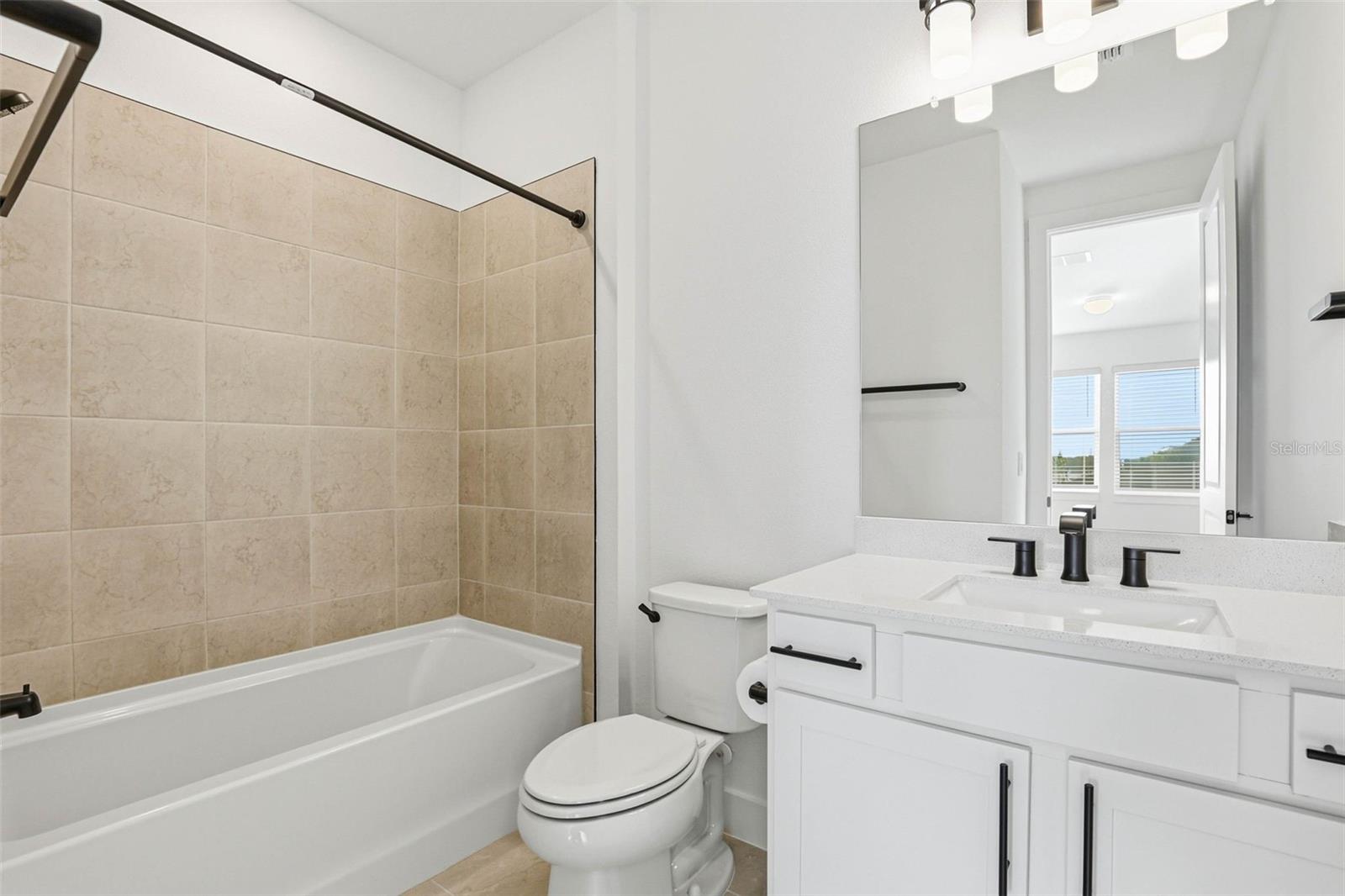 BEDROOM 4 W/ ENSUITE