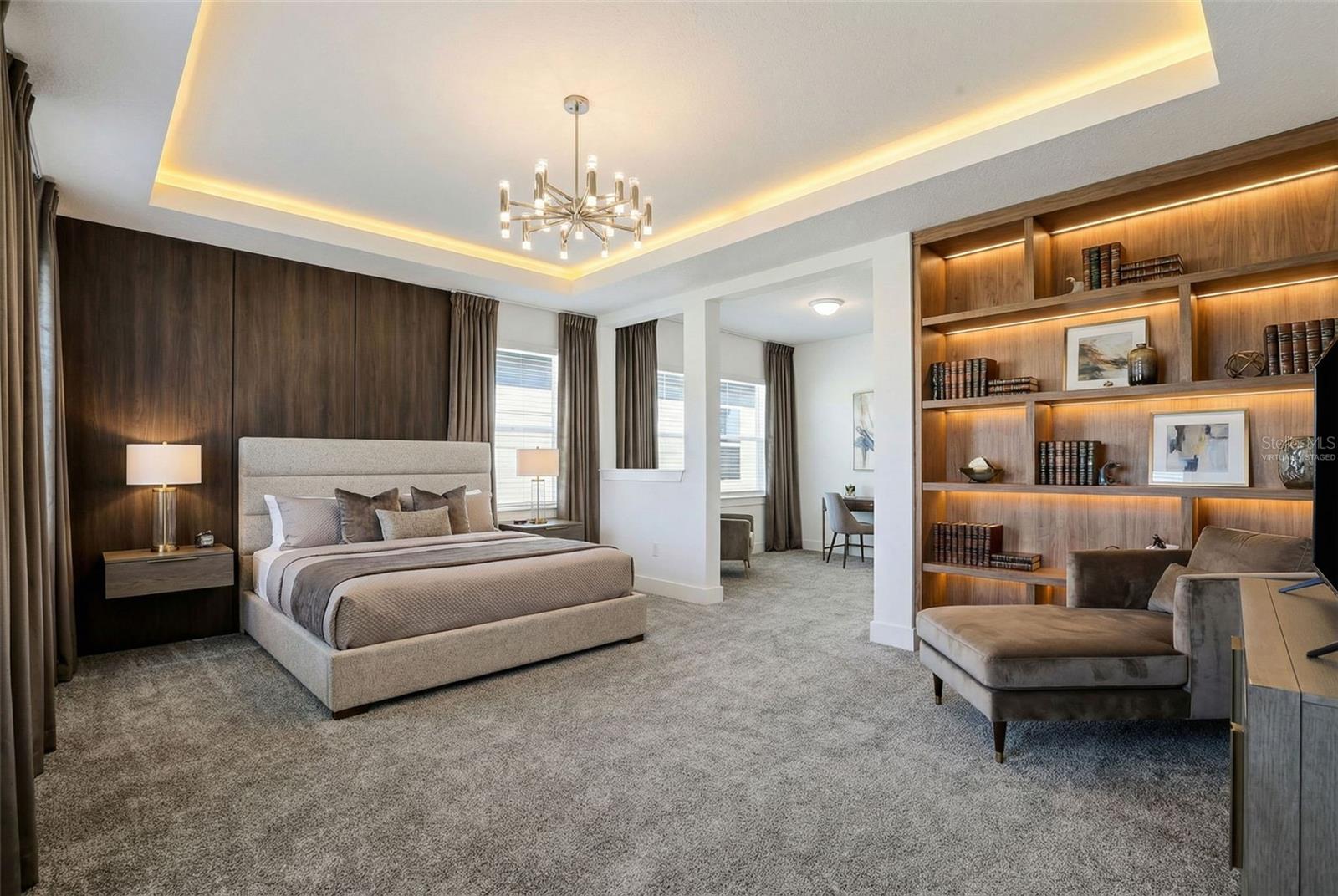 VIRTUALLY STAGED - PRIMARY SUITE W/ SITTING AREA