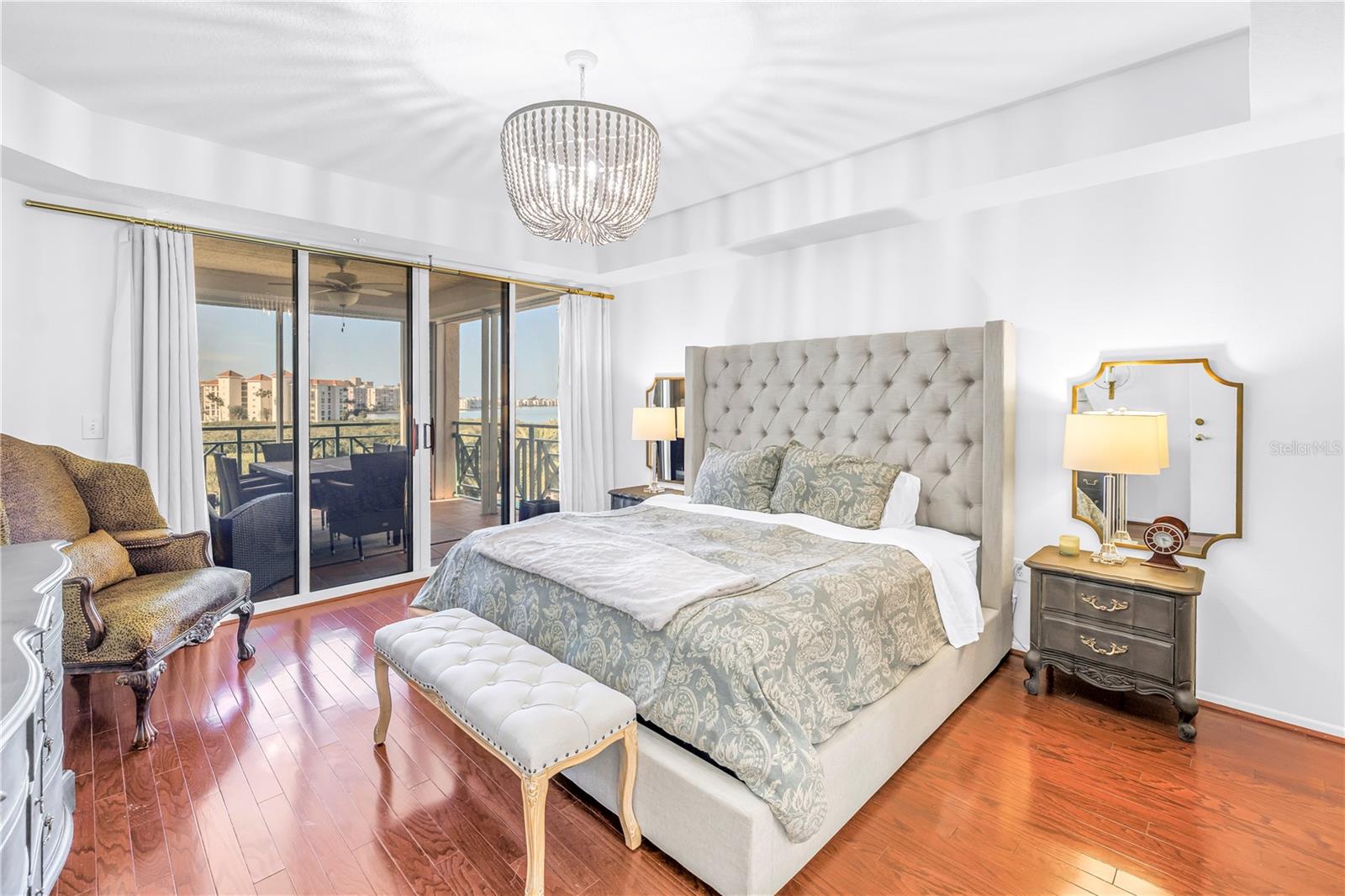 spacious primary with access to patio