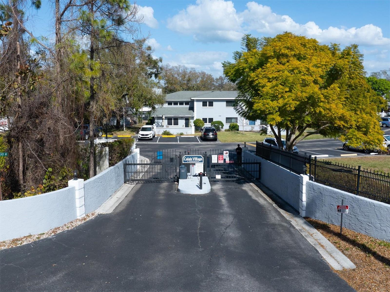 Gated entry from 54th Ave N
