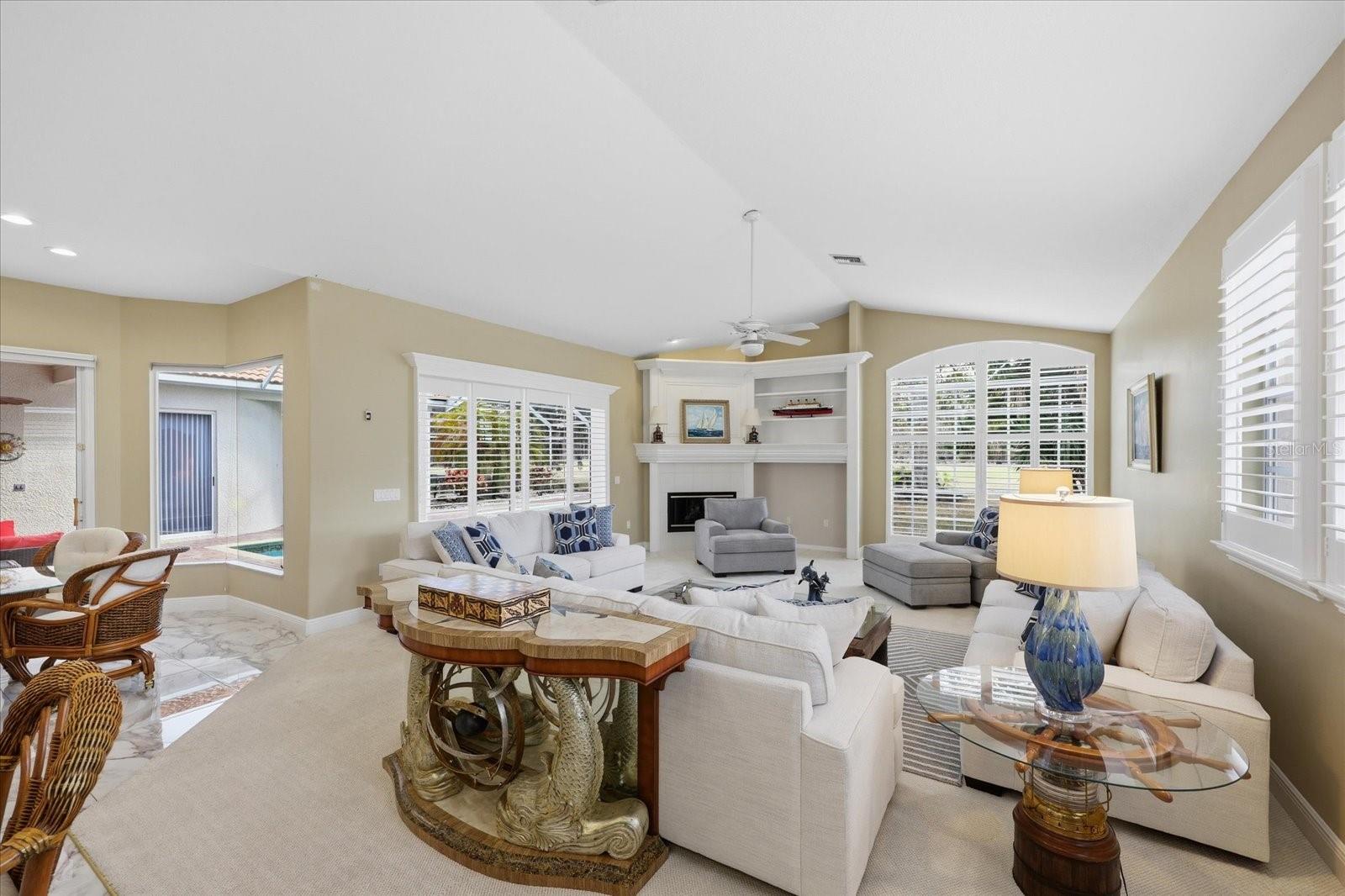 Family Room showcases Plantation Shutters Throughout