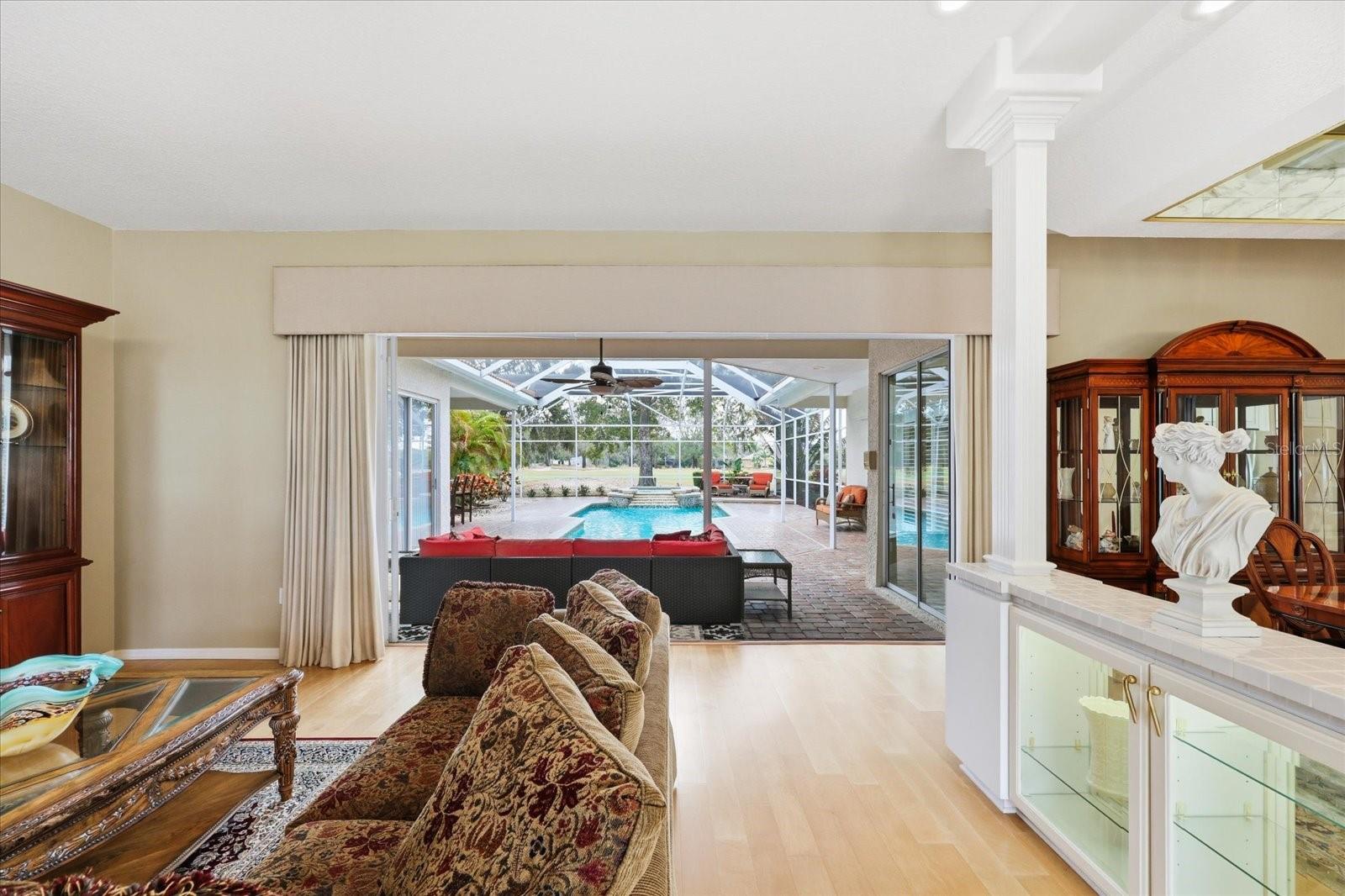 Wall of Sliders open to the Pool