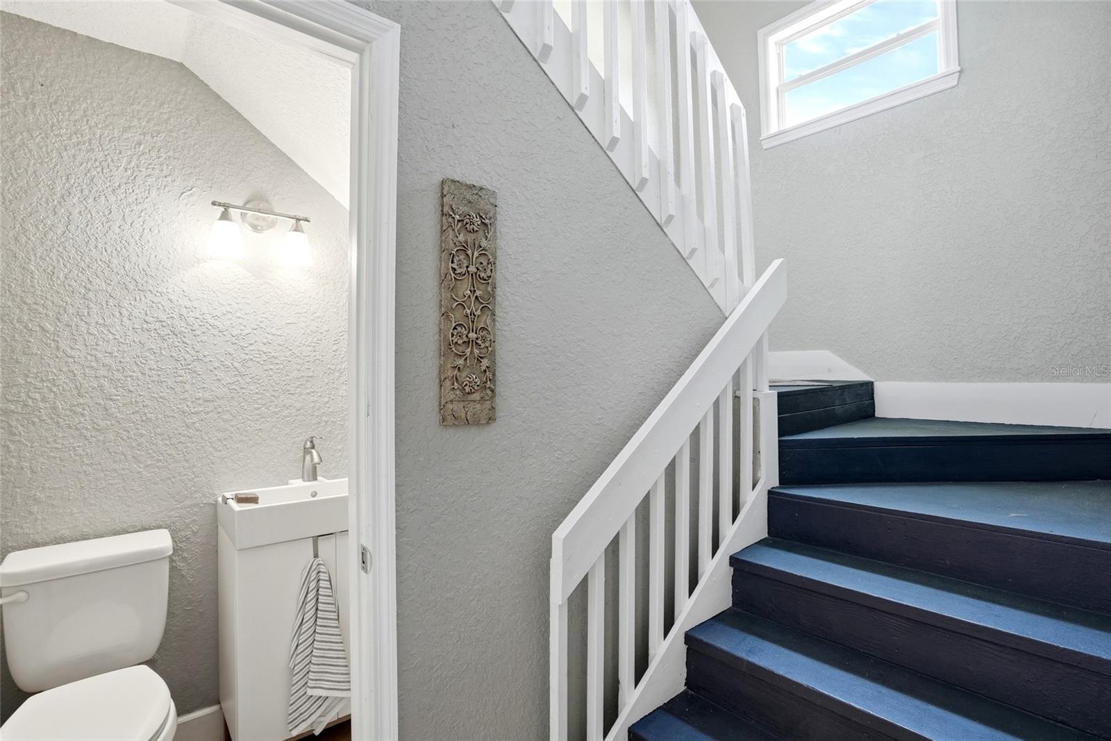 half bath leading to updsiars