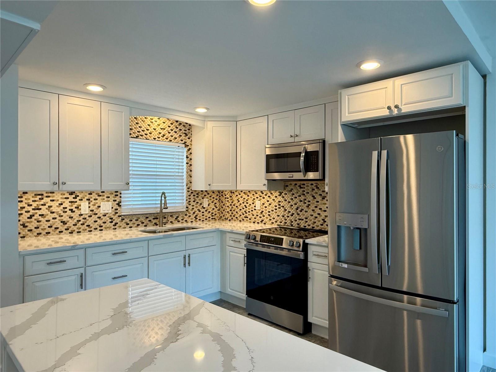 Kitchen island for additional counterspace and storage.