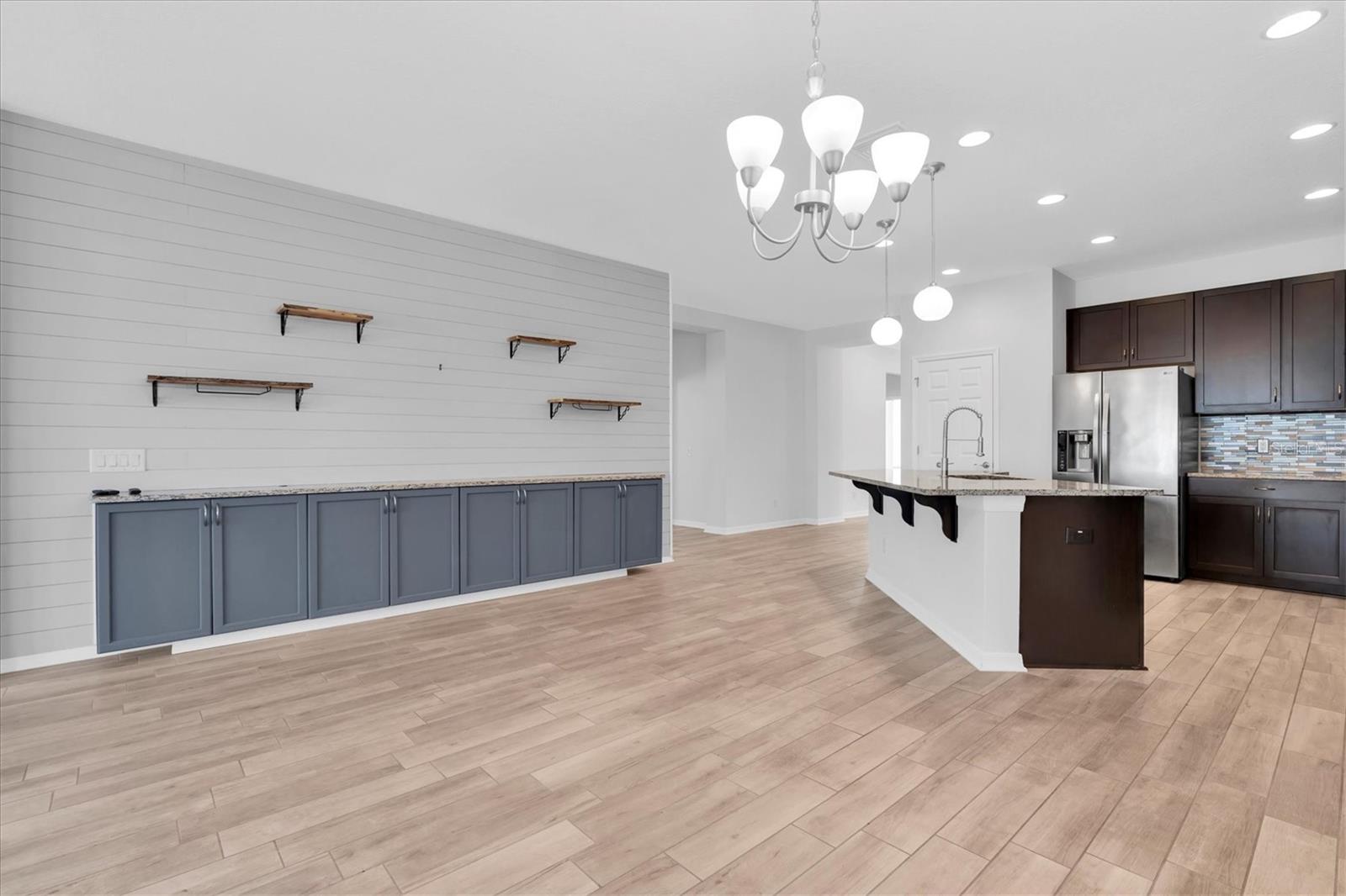 DINING ROOM WITH BUILT IN STORAGE CABINET & SHIPLAP