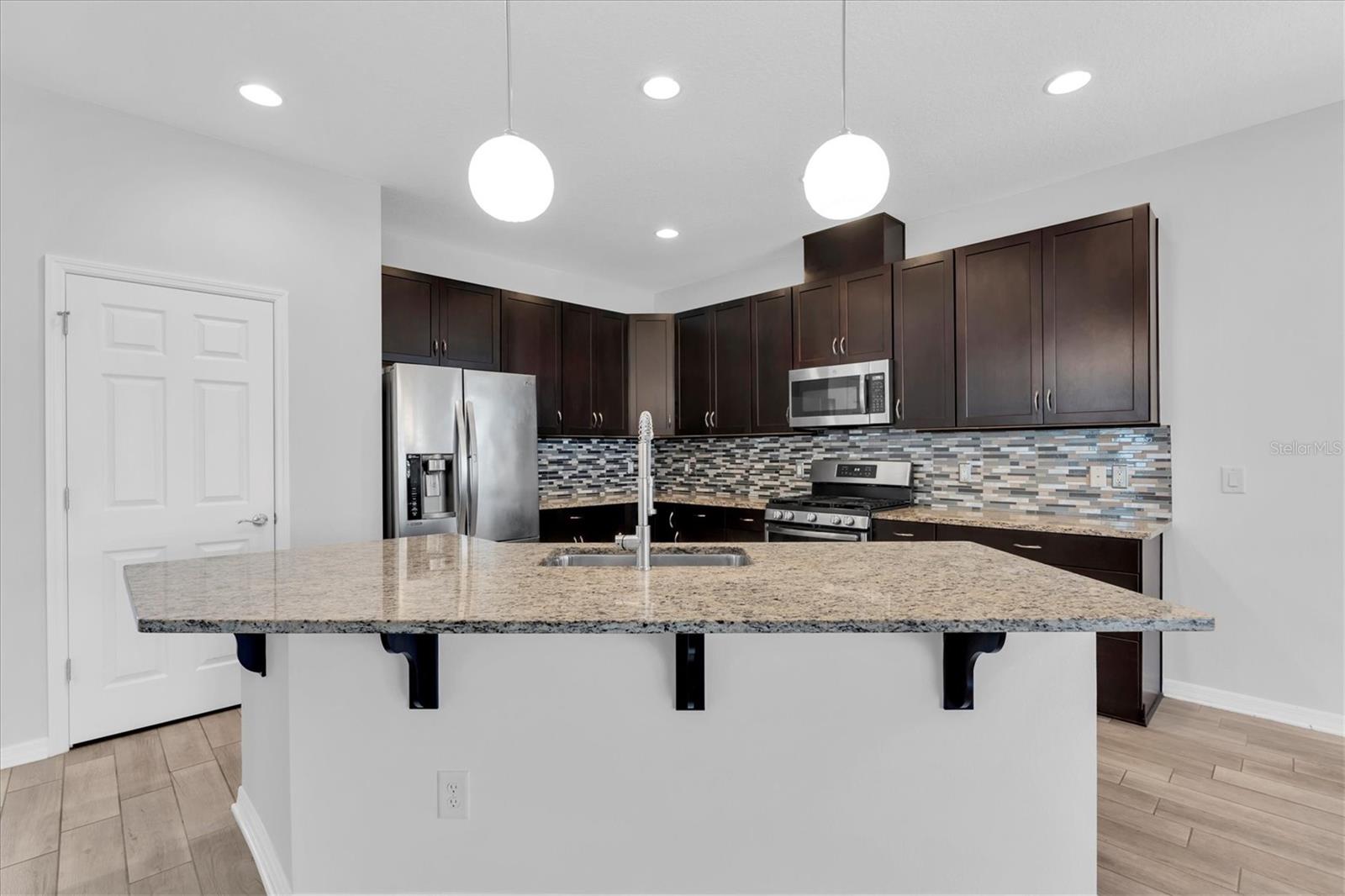 KITCHEN WITH SPACIOUS ISLAND