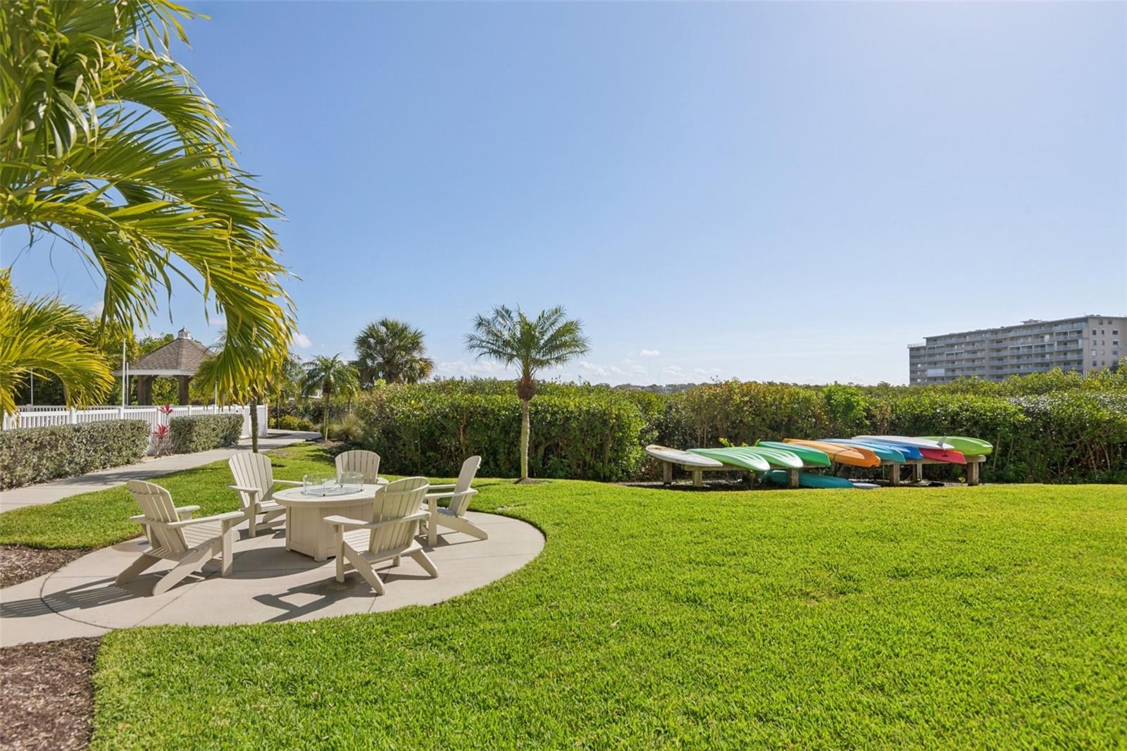 Firepit and kayak storage rack area.