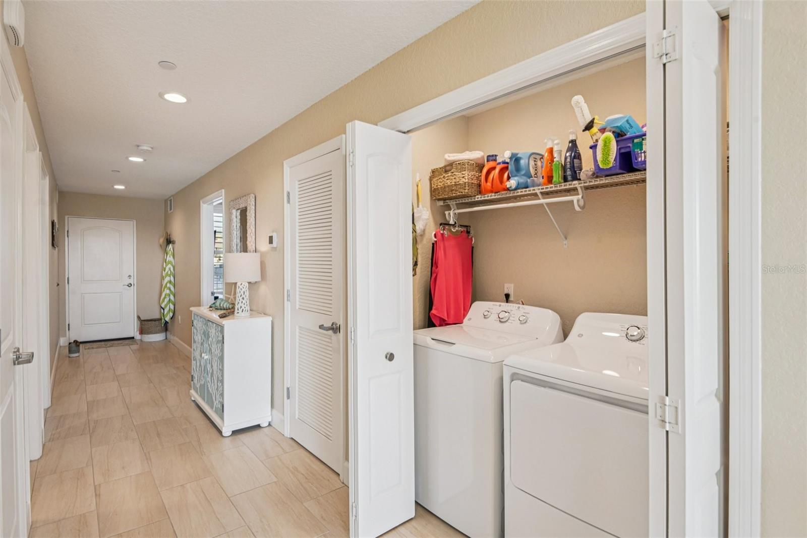 Laundry Closet with new washer and dryer.
