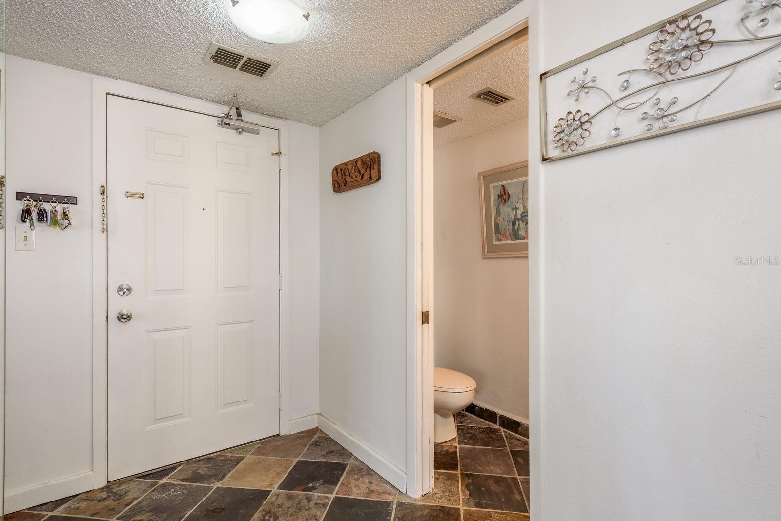 inside front door and hall bathroom
