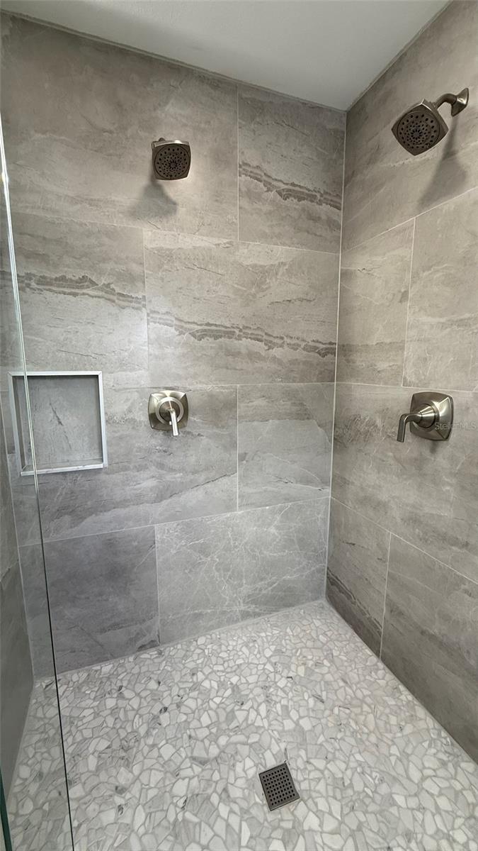 Luxurious Master Bath with Double Shower.