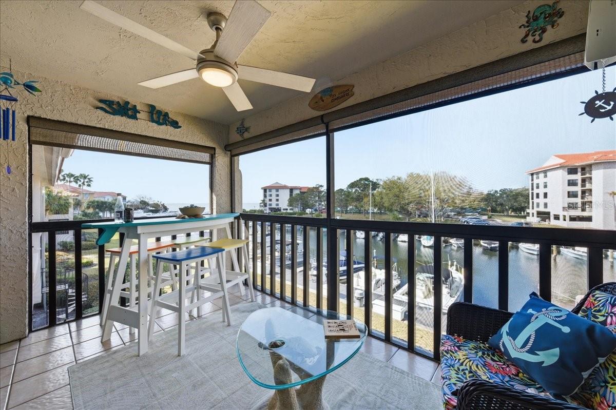 The spacious bumped-out balcony upgrades include tile floors, a decorative ceiling fan and roll down shades for comfort, and elevated second floor views of the marina and Saint Joseph Sound/Gulf of Mexico.  A truly ideal space to relax and enjoy enviable sunsets in the evenings and watch the boats come in and out and the birds and marine wildlife pass by during the day.
