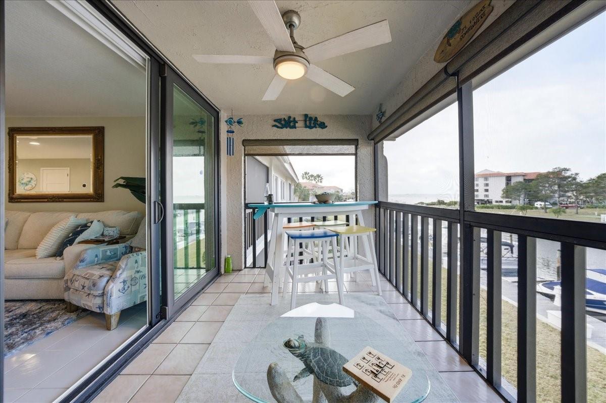 The spacious bumped-out balcony upgrades include tile floors, a decorative ceiling fan and roll down shades for comfort, and elevated second floor views of the marina and Saint Joseph Sound/Gulf of Mexico.  A truly ideal space to relax and enjoy enviable sunsets in the evenings and watch the boats come in and out and the birds and marine wildlife pass by during the day.