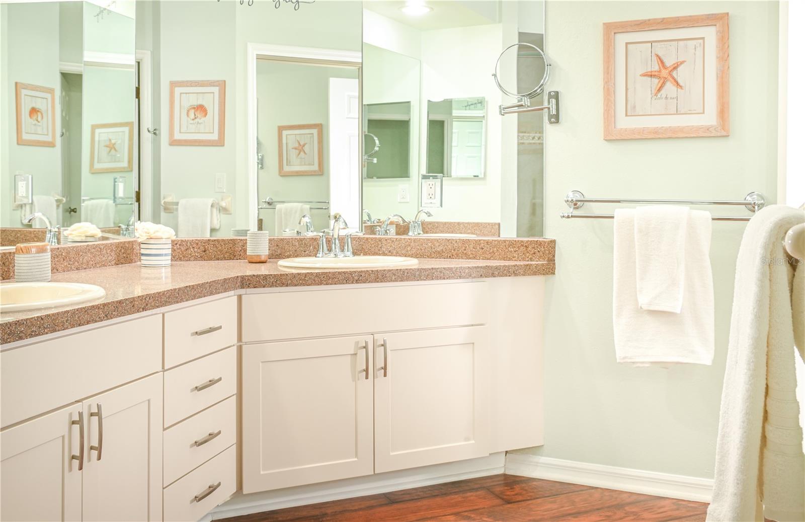 updated bathrooms include double sinks in the primary suite