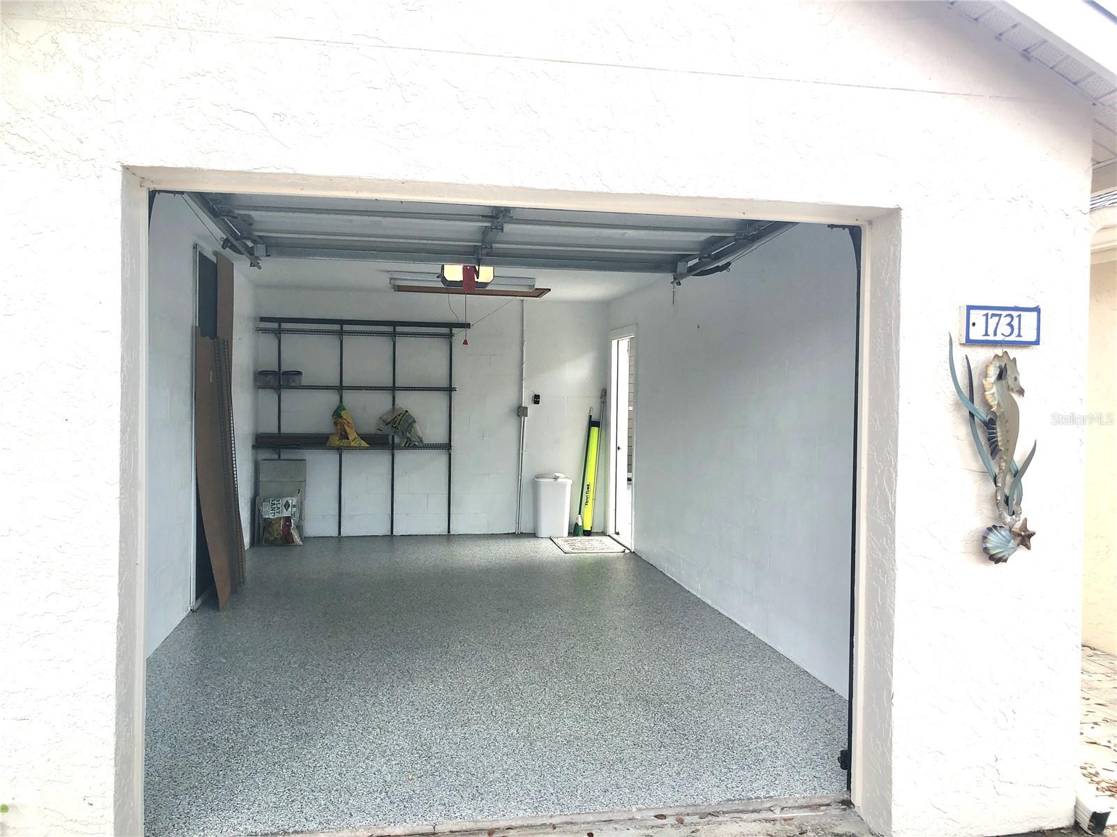 Garage floor boast the premium polyaspartic “Sparta-coat” floor protection by IntegrityConcrete Coatings.