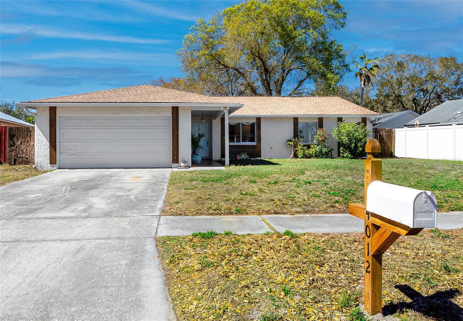 4 Bed, 2 Bath 2 Car Garage Home at 14012 Cascade Ln, Tampa, FL 33618