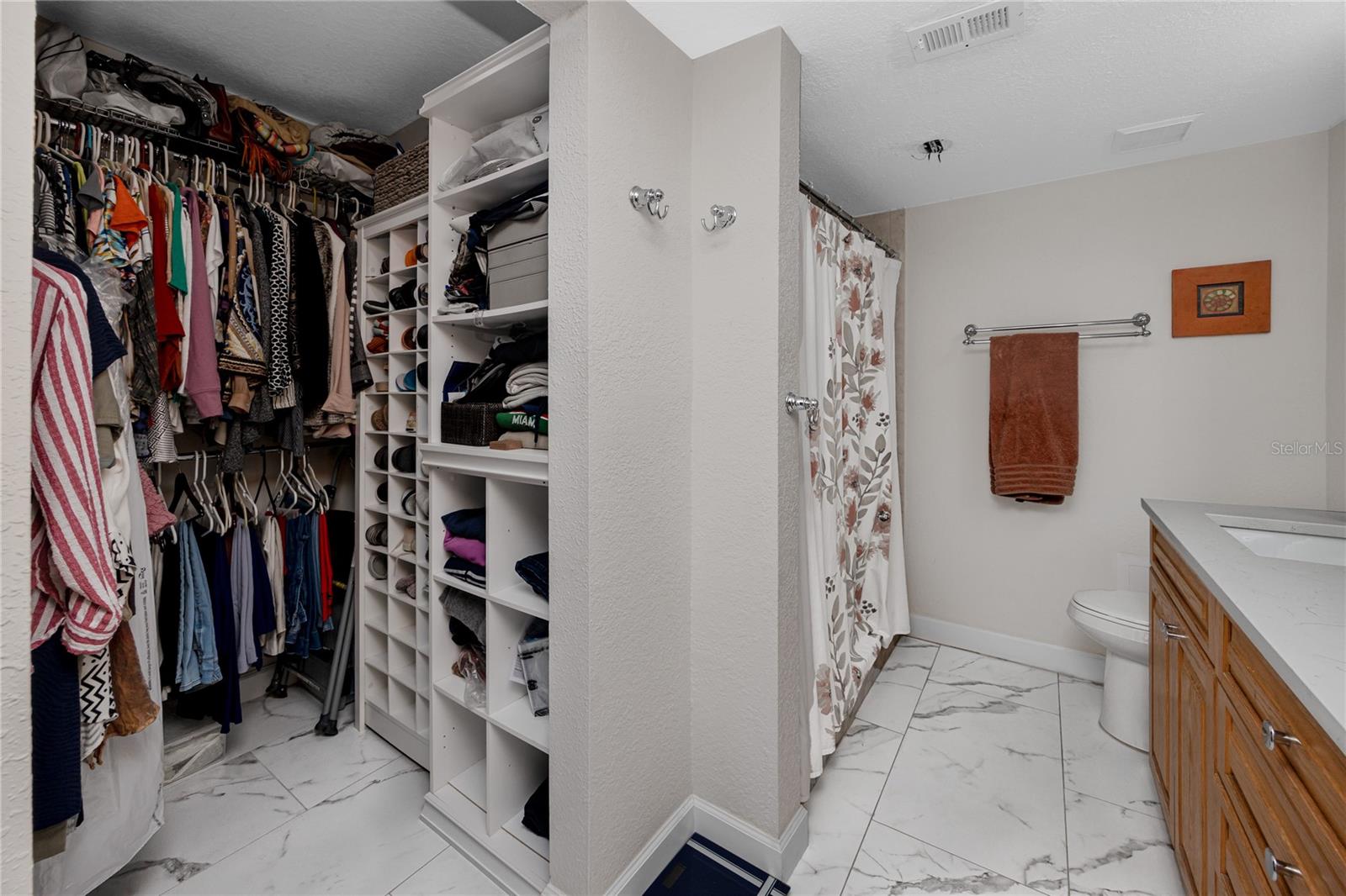 Main Closet and Main Bathroom with shower
