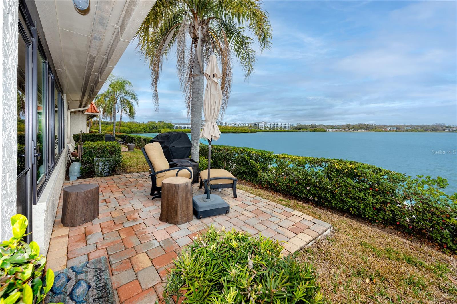 Back of unit with pavered patio