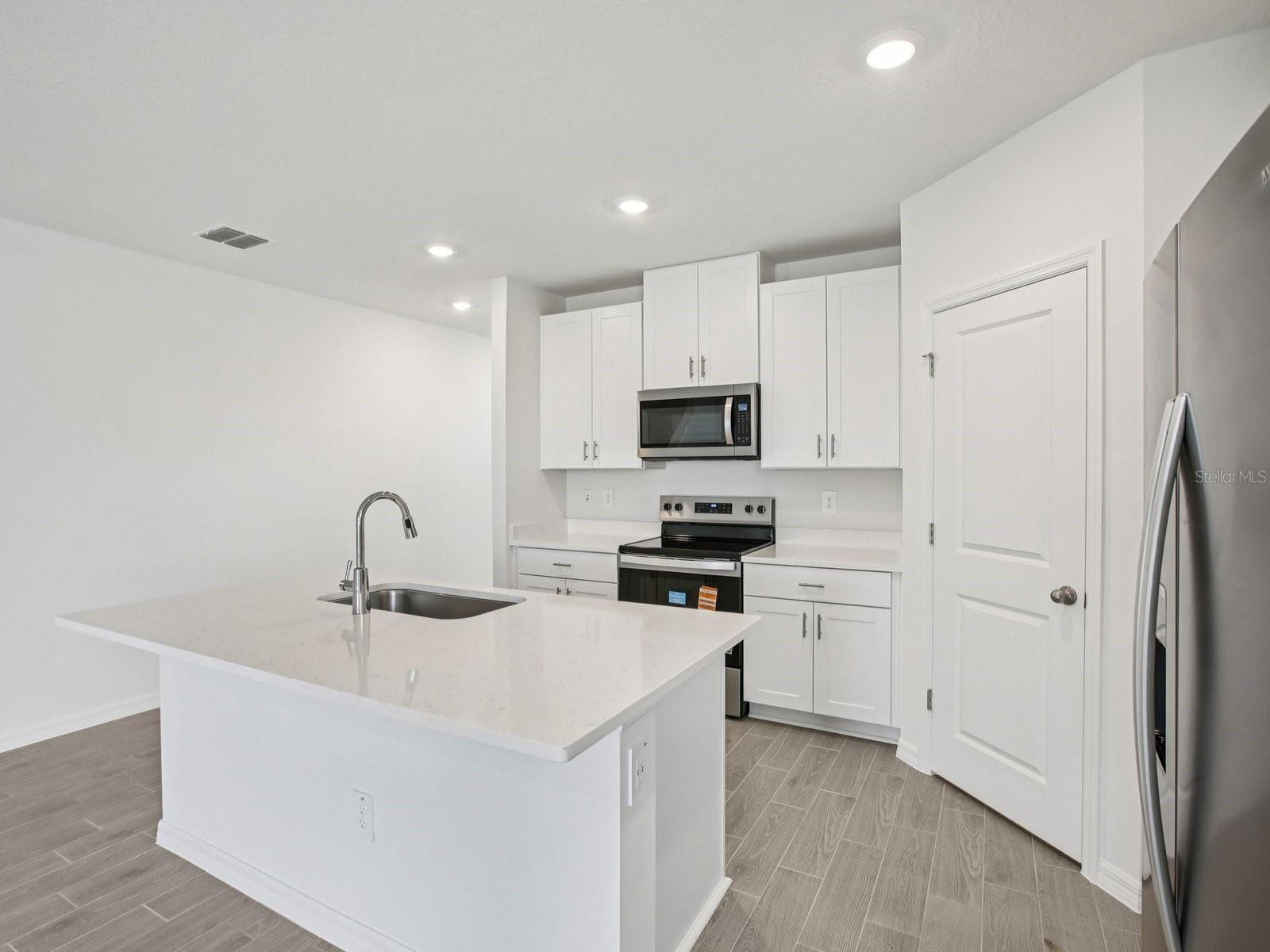 Interior photos are not of the actual home but are photos of the builder home with the same floorplan with similar interior finishes and features.