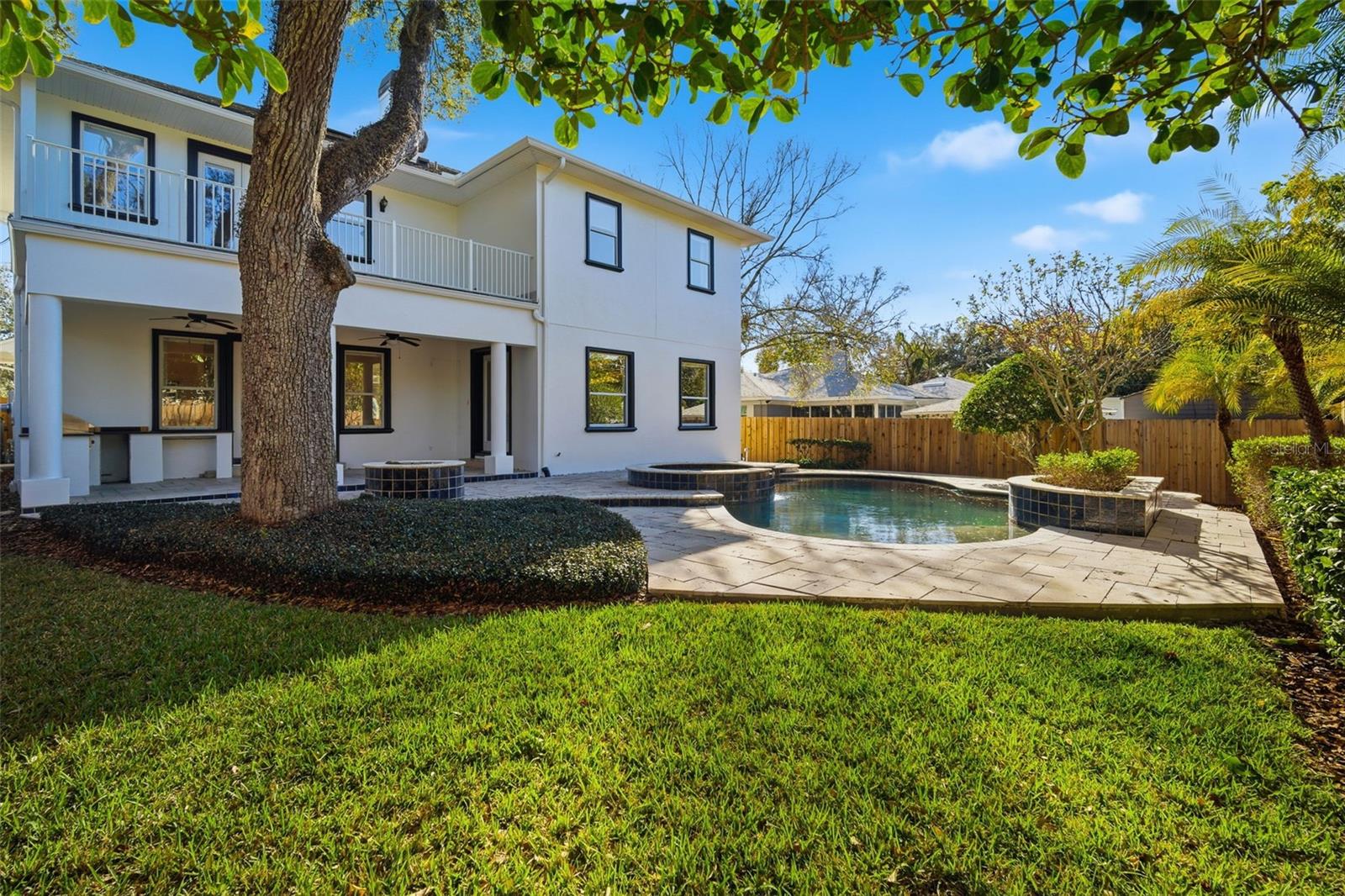 Pool/Spa with firepit on the left
