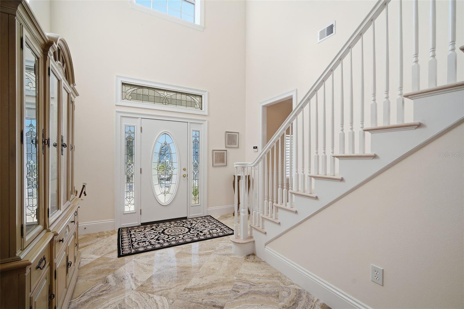 2-story foyer, with large storage closet.