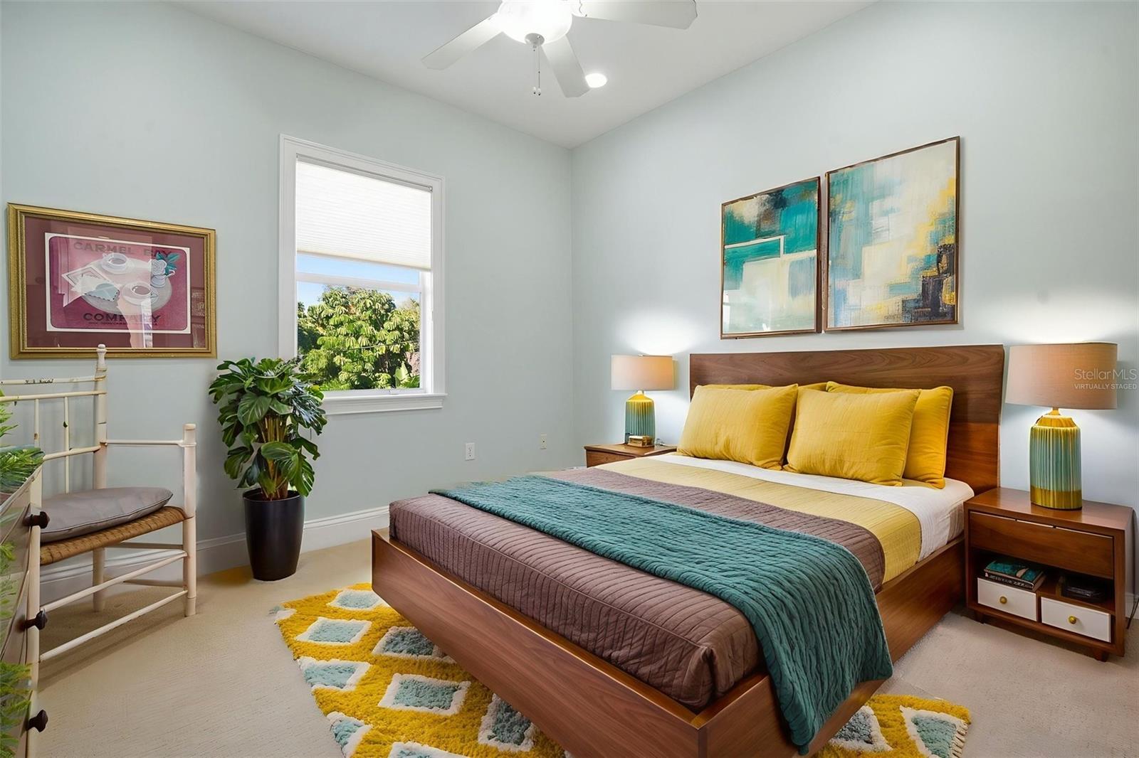 Photo is virtually staged. Bedroom number 2 with walk-in closet, private En suite bath.