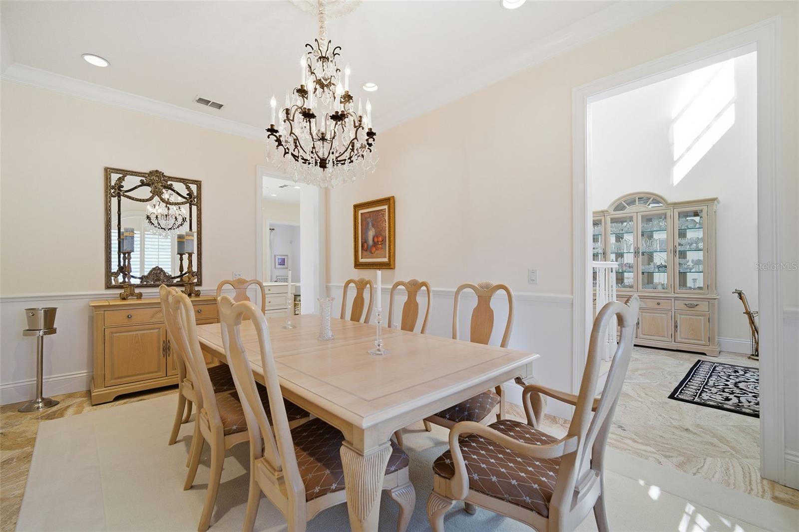 Dining room looking to entry foyer and kitchen