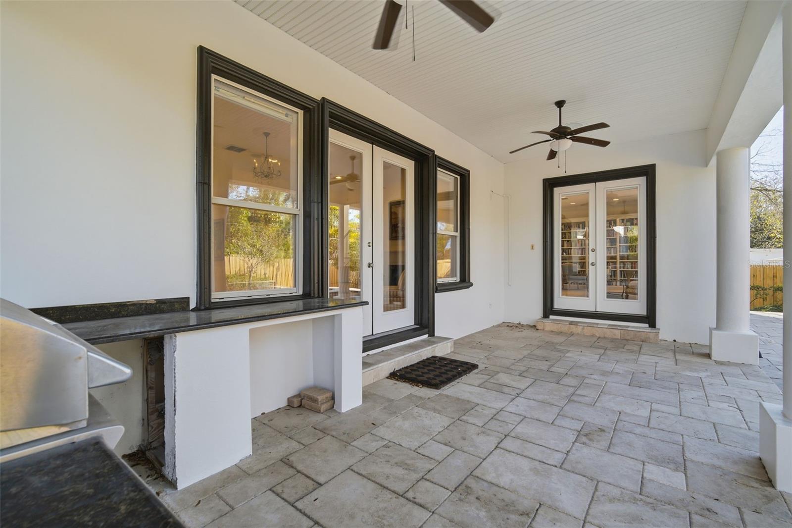 Looking French Doors leading to family room and living room