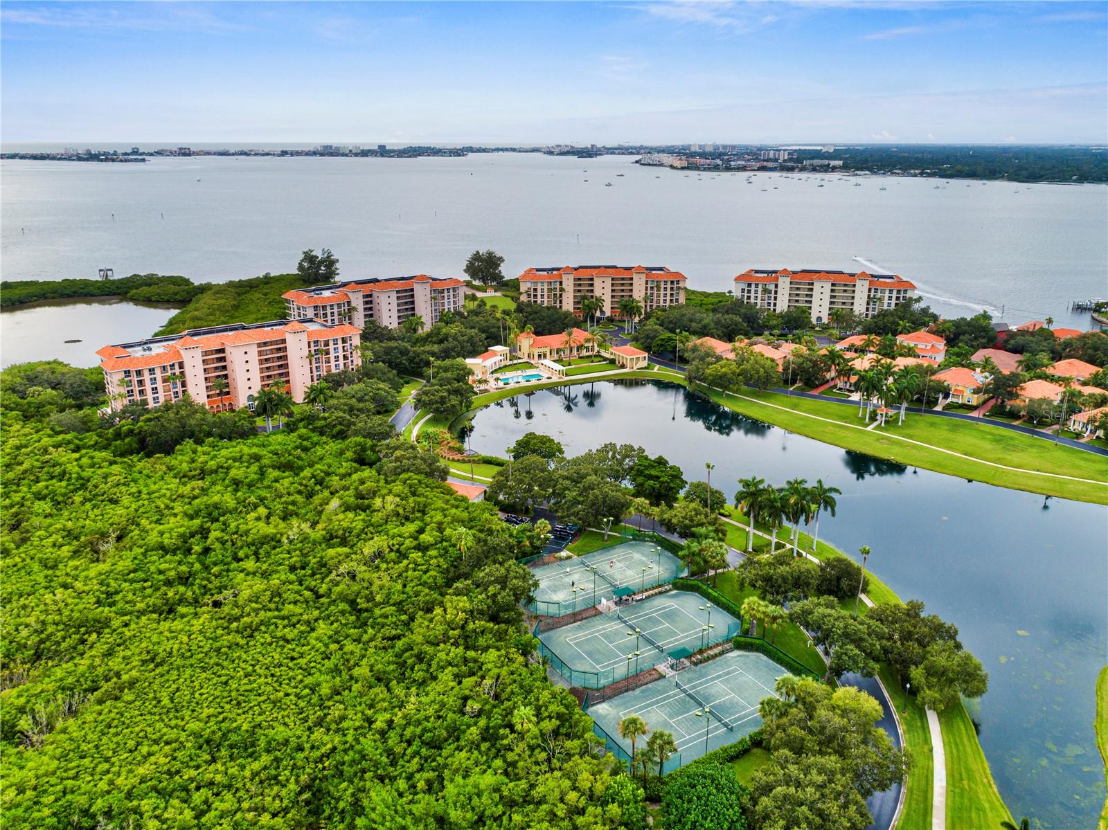 Multiple Tennis courts and main Dolphin Cay Lake & Campus