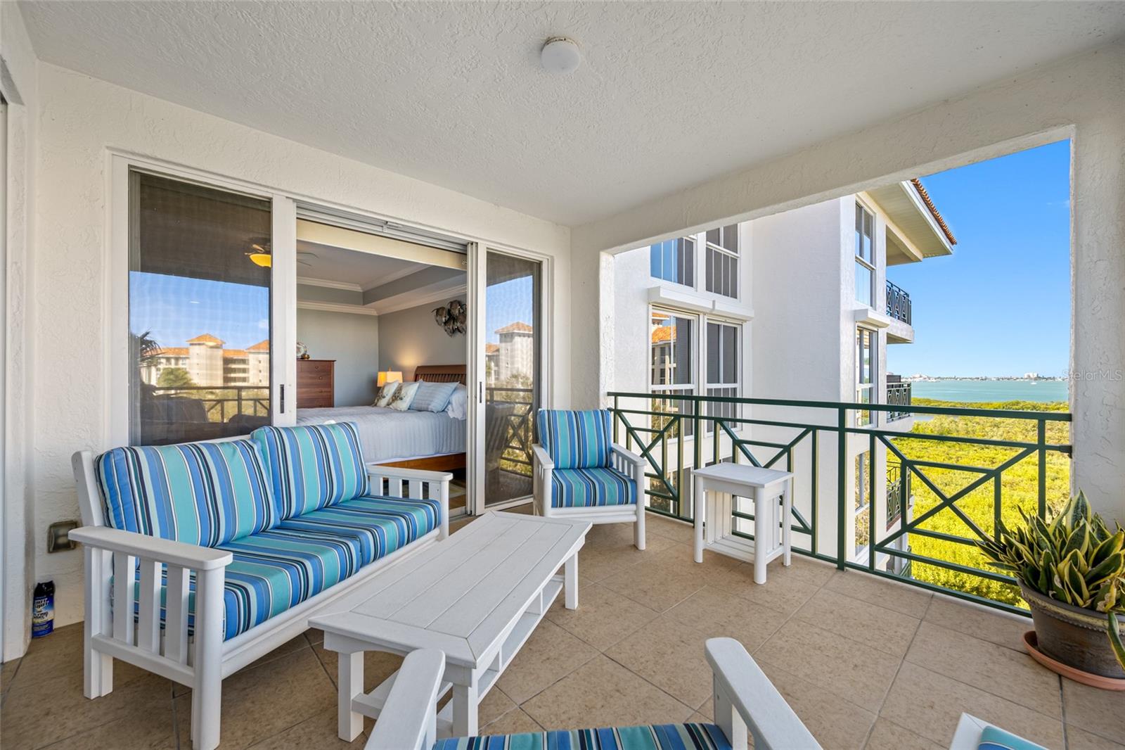 Large main patio with view of Intercoastal waterway & Gulf of Mexico