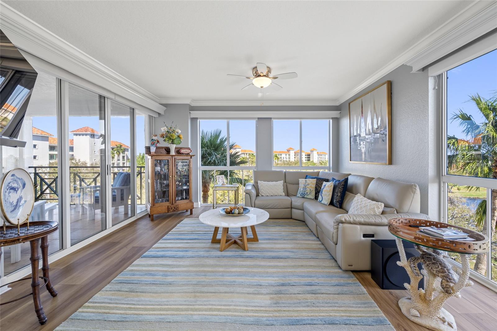 Bright family room connected to main balcony's