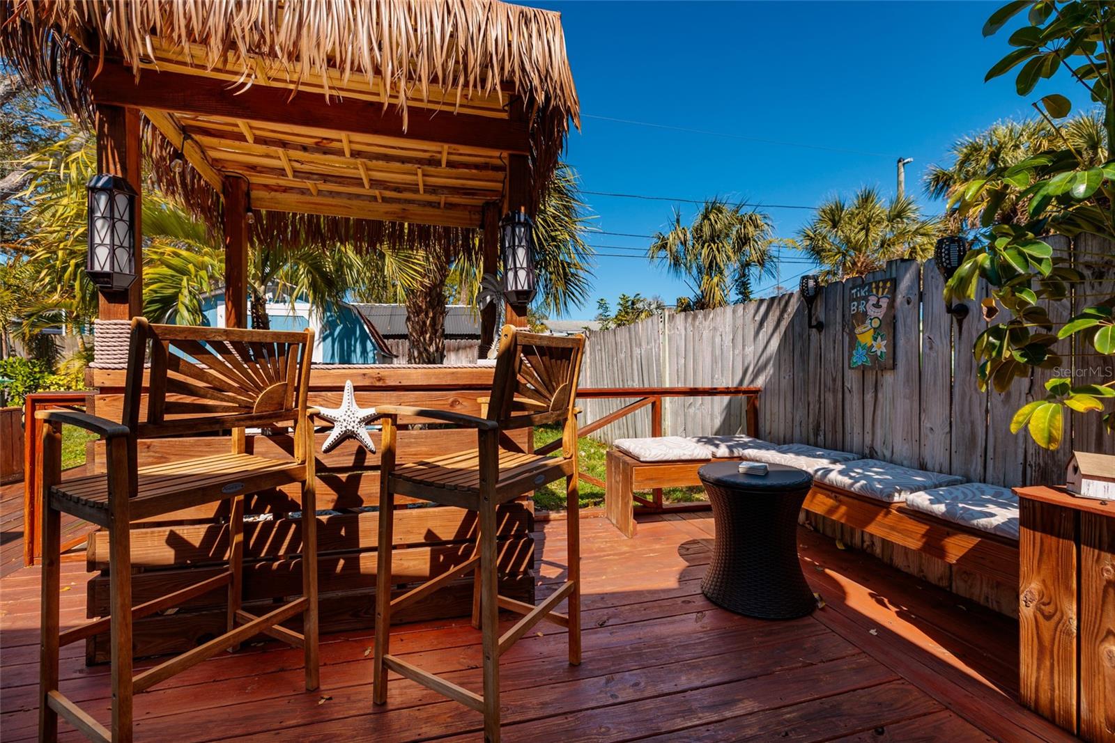 Tiki Hut & sitting area on back deck.