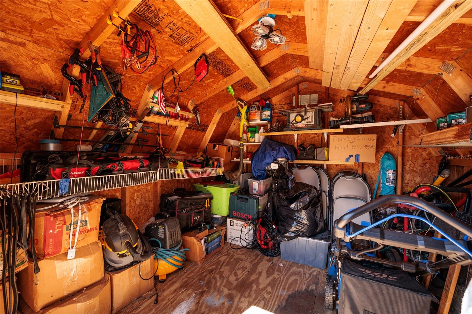 Large shed w/Electric & new lawnmower conveys.