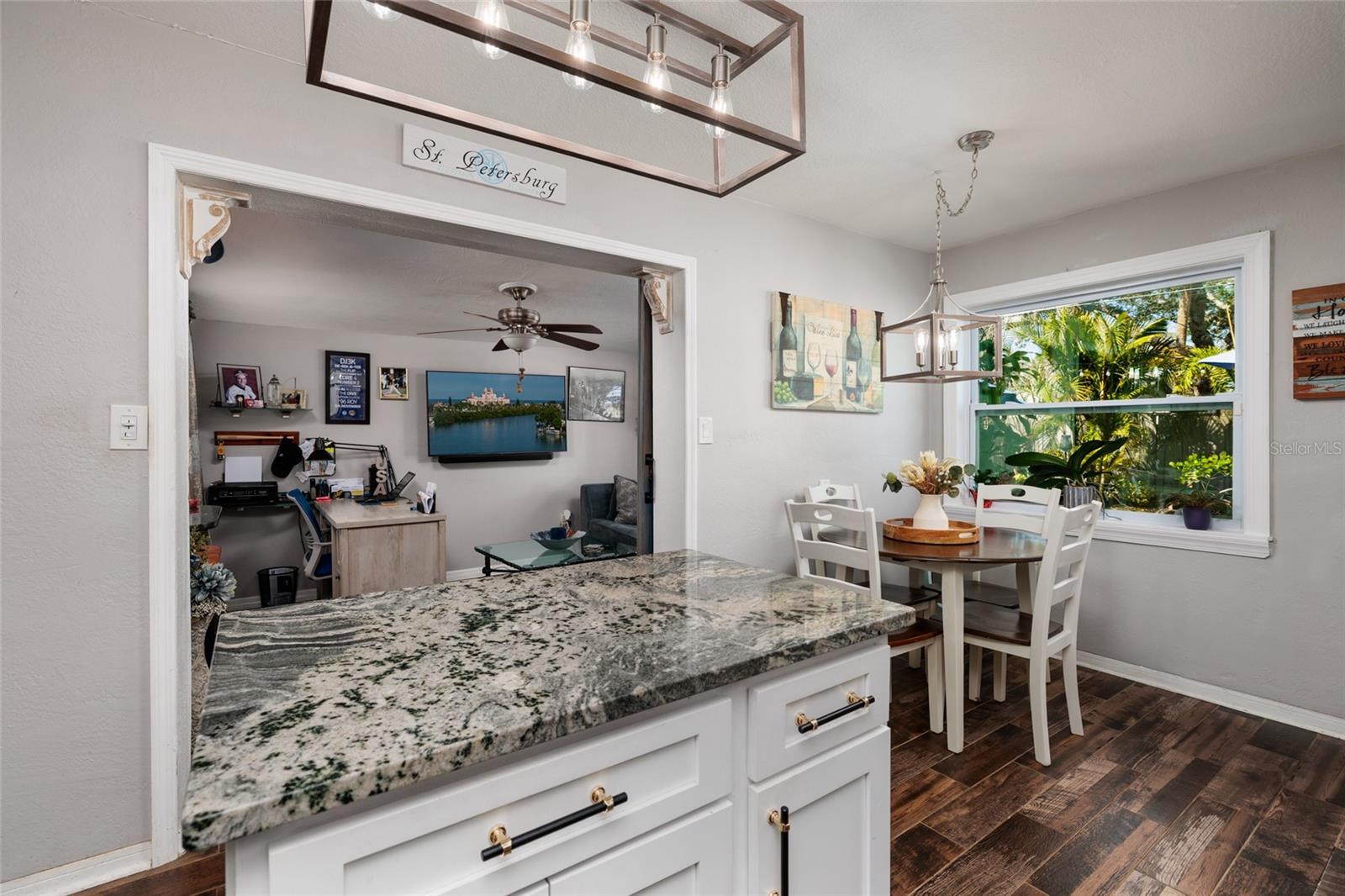Kitchen & Dining area. Entrance to Office/Den.