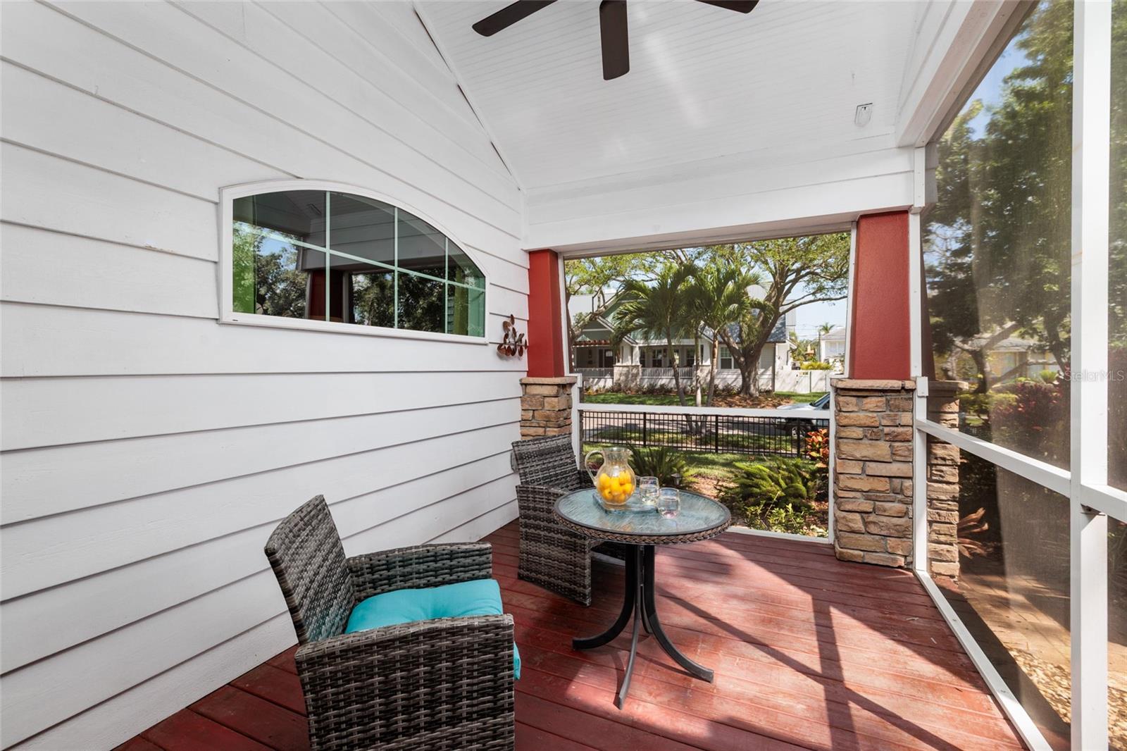 Enjoying nature on your screened porch.