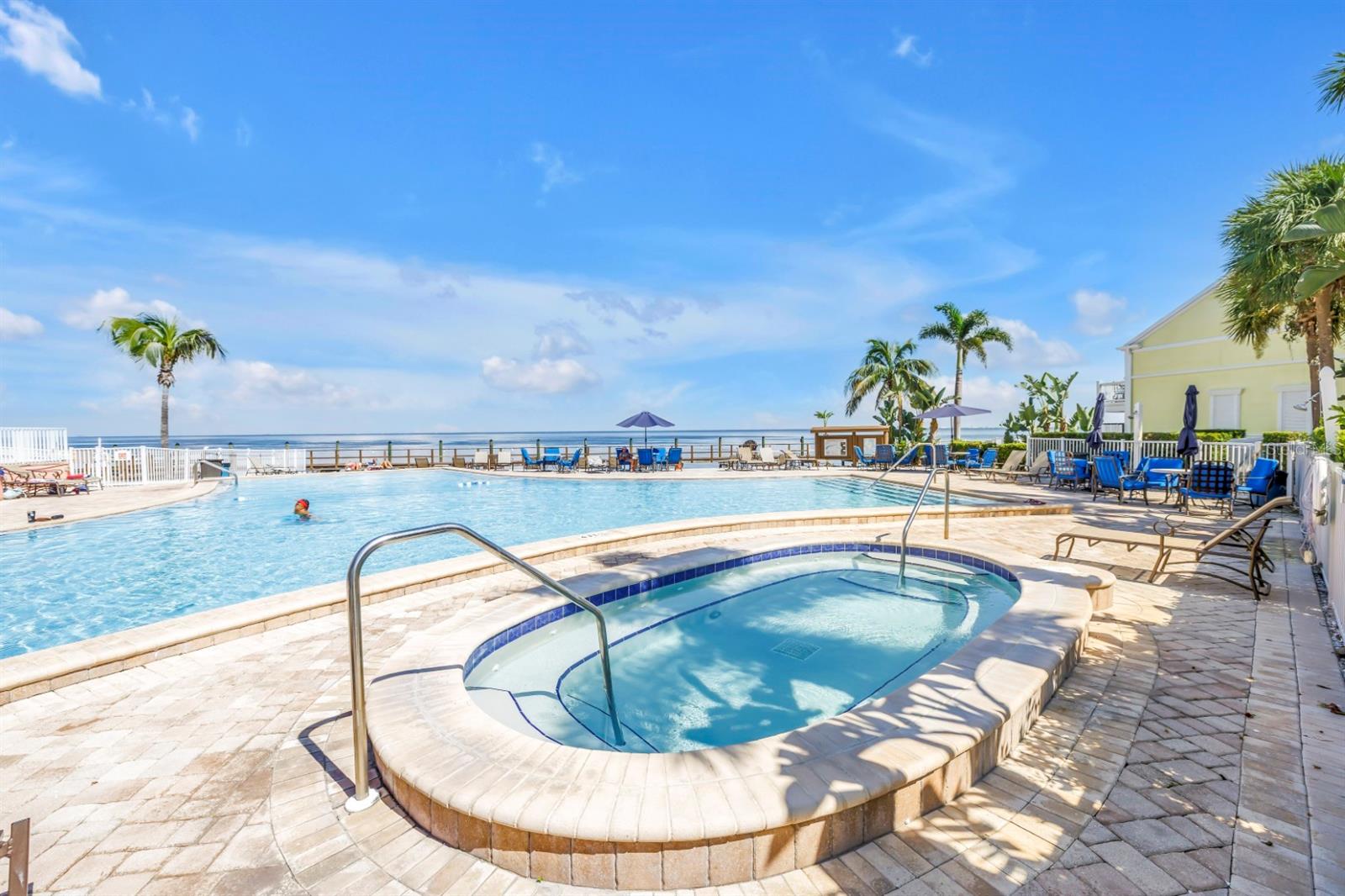 Waterfront pool and spa offering a true resort-style experience.