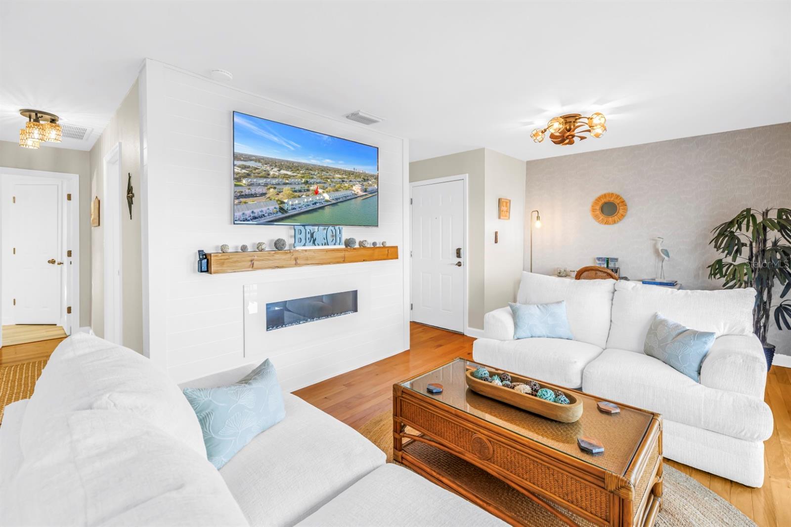 Electric fireplace offering cozy ambiance at the touch of a button.