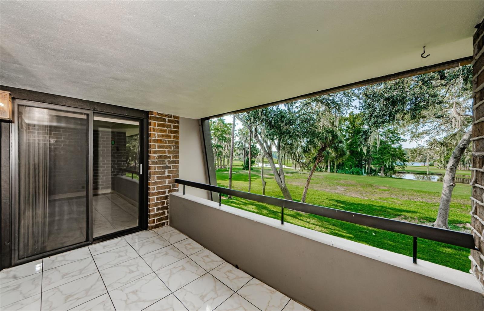 SLIDING DOORS TO MASTER BEDROOM OFF OF PRIVATE BALCONY