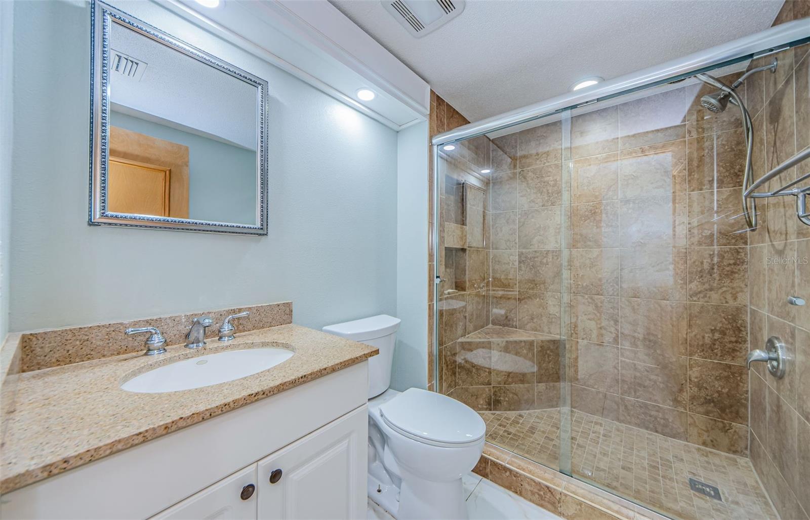 UPDATED BATH WITH BENCH IN SHOWER