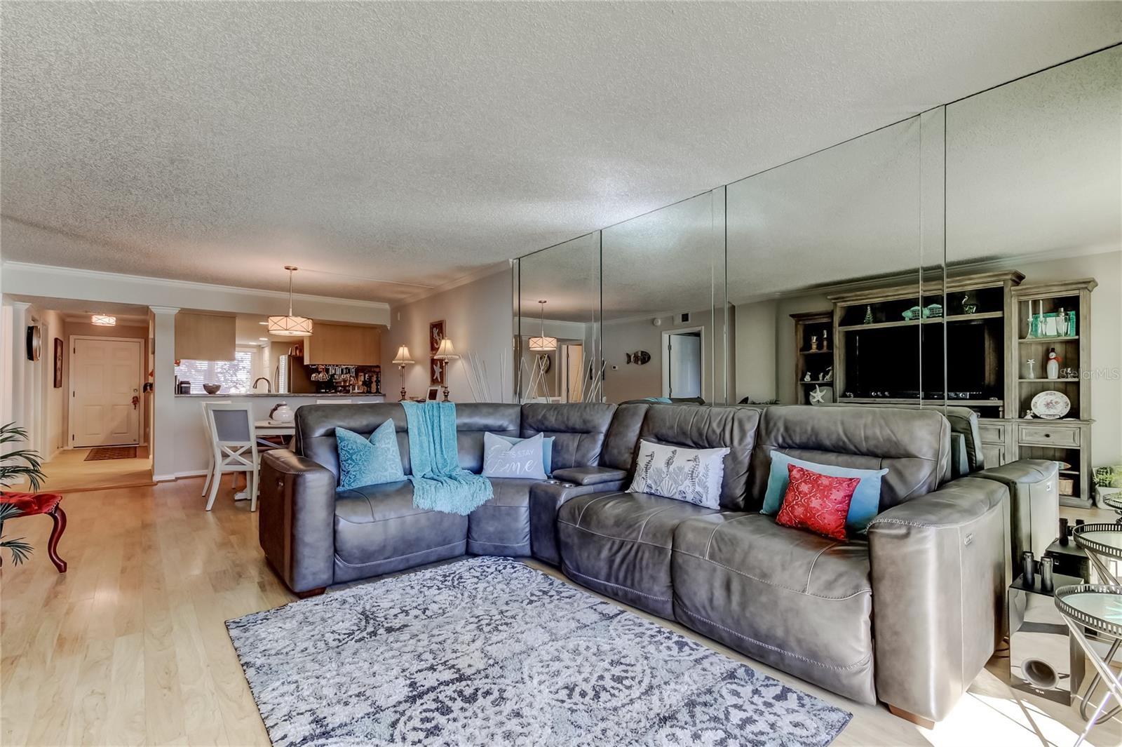 Living Room with view of Dining Area and Kitchen
