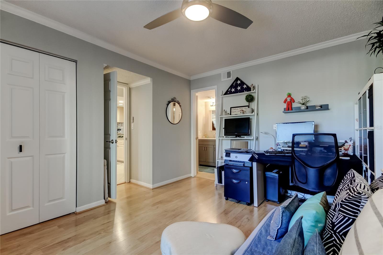 Bedroom 2 has spacious closet, door to hallway, and door to Jack and Jill closet.