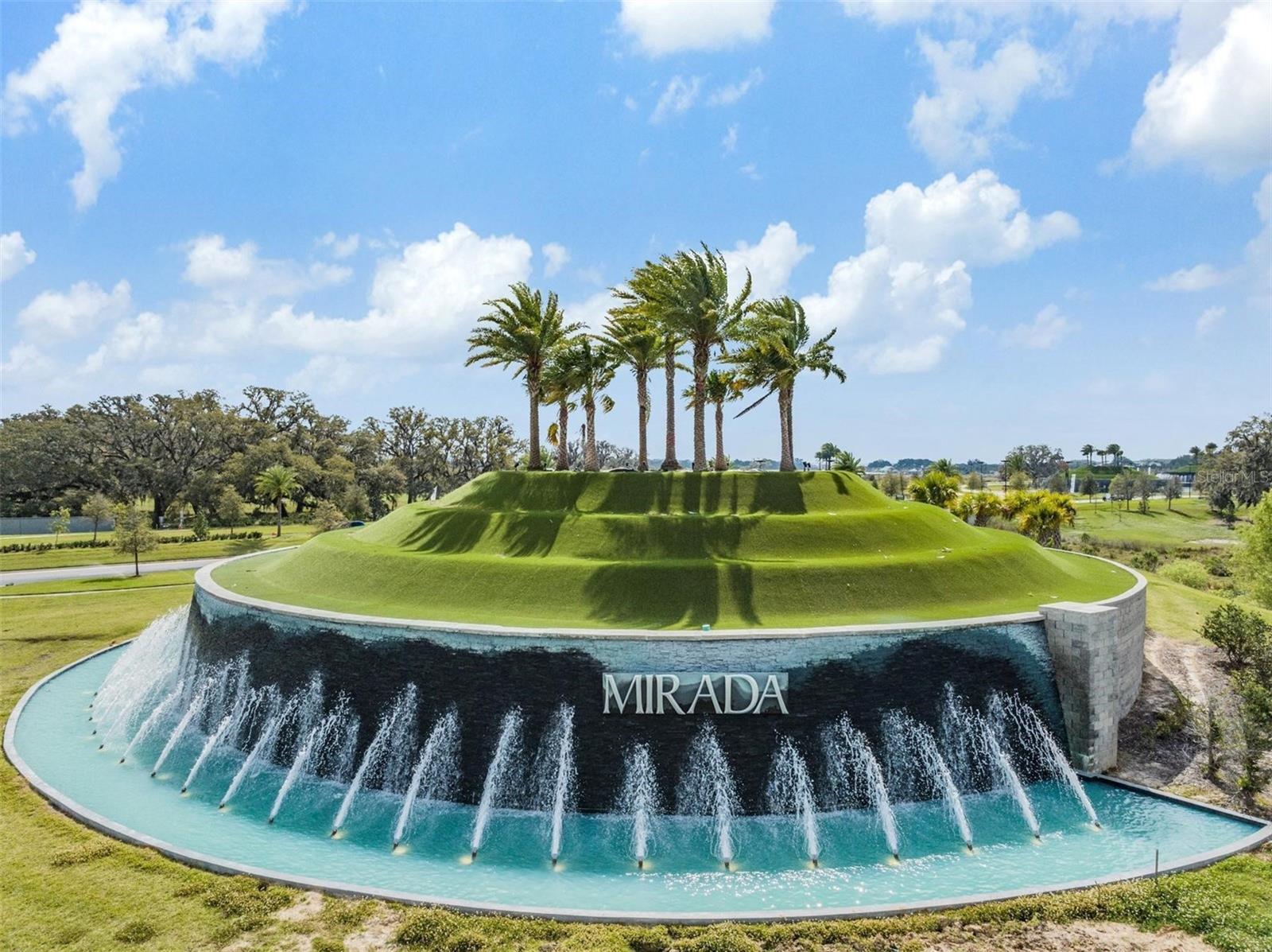 Serene tropical water features welcome you home!